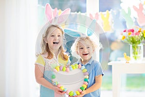 Kids on Easter egg hunt. Children dye eggs