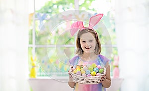 Kids on Easter egg hunt. Children dye eggs