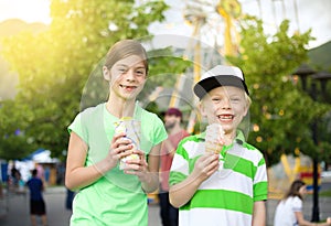 Kids eating ice cream and treats at the carnival photo