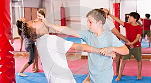 Kids exercising self-defense movements