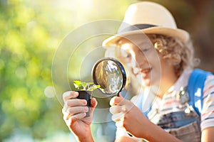 Kids explore nature. Children hike in sunny park