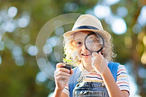 Kids explore nature. Children hike in sunny park