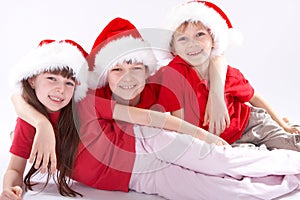 Kids in festive Santa hats