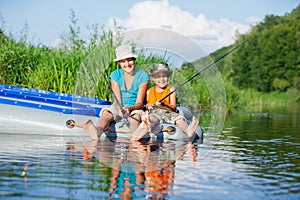 Kids fishing at the river