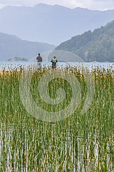 Kids fishing, Road of the Seven Lakes, Argentina