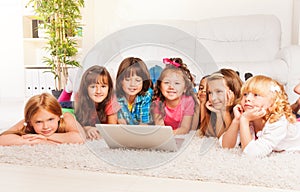 Kids on the floor with laptop