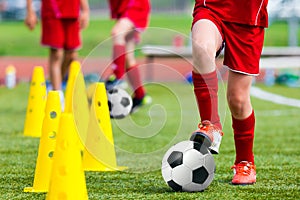 Kids Football Soccer Training.Young Athlete with Football Ball