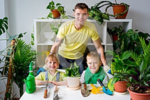 Kids gardening with their father