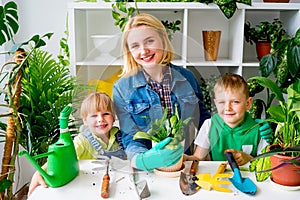 Kids gardening with their mother