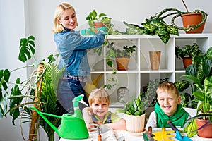 Kids gardening with their mother