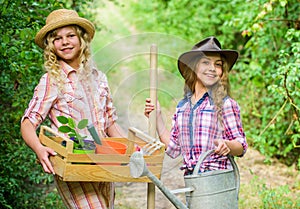 Kids girls with tools for gardening. Gardens great place cultivate meaningful and fun learning experience for children
