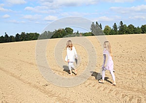 Kids - girls walking on field