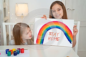 Kids girls write stay home. flashmob. rainbow