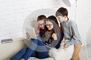 Kids in glasses with gadgets, computer addiction