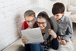 Kids in glasses with tablet, computer addiction