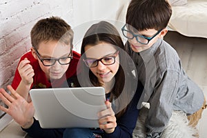 Kids in glasses with tablet, computer addiction