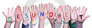 Kids Hands Holding Word Gesundheit Means Health, Isolated Background photo