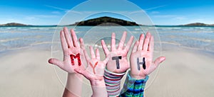 Kids Hands Holding Word Myth, Ocean Background