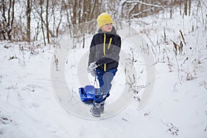 Kids have fun sledding with snow slides