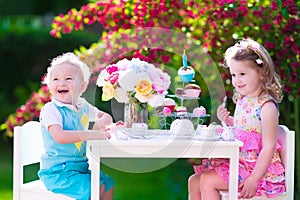 Kids having fun at garden tea party