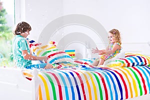 Kids having pillow fight