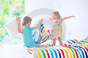 Kids having pillow fight