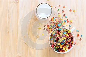 Kids healthy quick breakfast. Colorful rice cereal with milk on