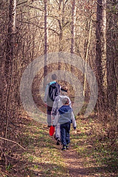 Kids hiking through a forest