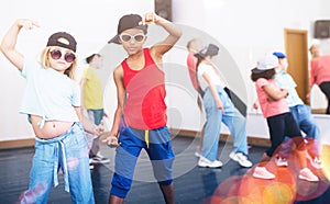 Kids hip hop dancers posing at studio