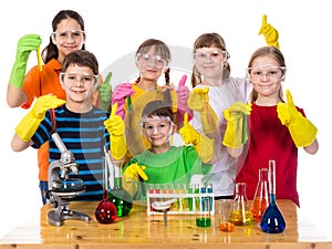 Kids holding chemical test-tubes