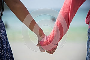 Kids holding hands together, friendship concept. Family childhood brother and sister play together in summer times. Happiness love