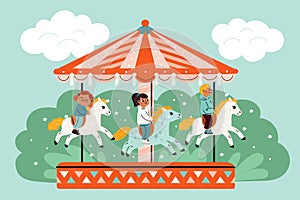 Kids horses carousel. Park entertainment. Boys and girls riding merry-go-round. Children on decorative animals