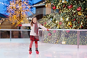 Kids ice skating in winter. Ice skates for child