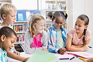 Kids interacting with each other in library