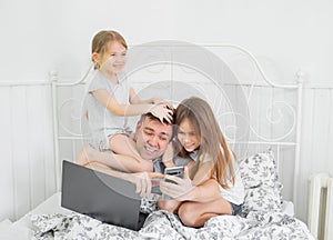 Kids interfere father freelancer work at home photo