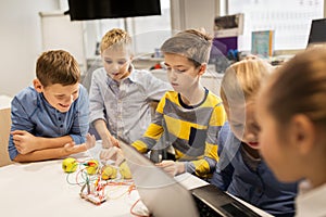 Kids with invention kit at robotics school