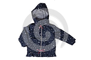 Kids jacket isolated. A stylish fashionable dark blue jacket with white dots and blue white striped lining for the little girl. A