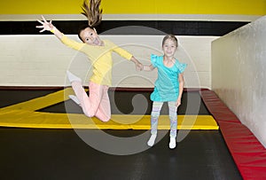 Kids Jumping on Indoor Trampolines