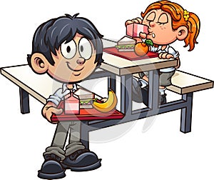 School boy and girl in uniform having lunch