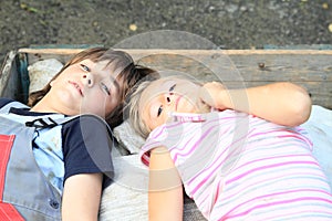 Kids lying on carriage