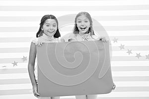 Kids make advertisement. advertising your product. smiling little girls kids hold blue advertisement poster for copy