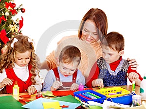 Kids making decoration for Christmas.