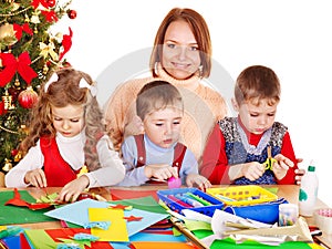 Kids making Santa card for Christmas.