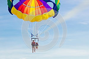 Kids parasailing. Water sport on summer vacation