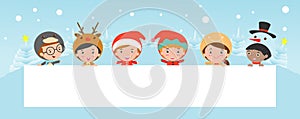Kids peeping behind placard, children and greeting Christmas and New Year card, boy and girl in Christmas costume characters