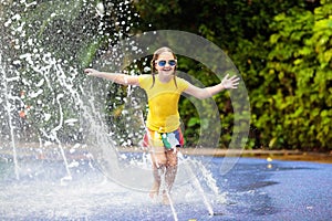 Kids at aqua park. Child in swimming pool.