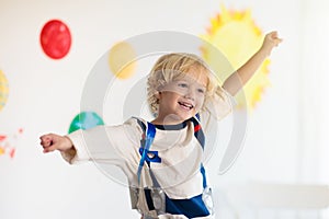 Kids play astronaut. Space and planet child game