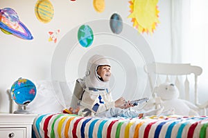 Kids play astronaut. Space and planet child game