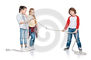 Kids play tug of war