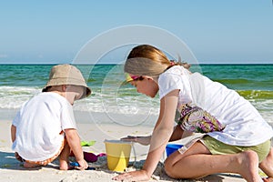 Kids playin by the ocean